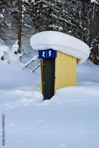 Wallpaper Mural Open metal toilet in the snow with a large snowdrift on the roof. Torontodigital.ca
