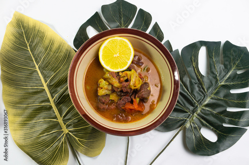 Tongseng Sapi Kambing is a traditional mutton curry  ,typical Indonesian food made from mutton photo