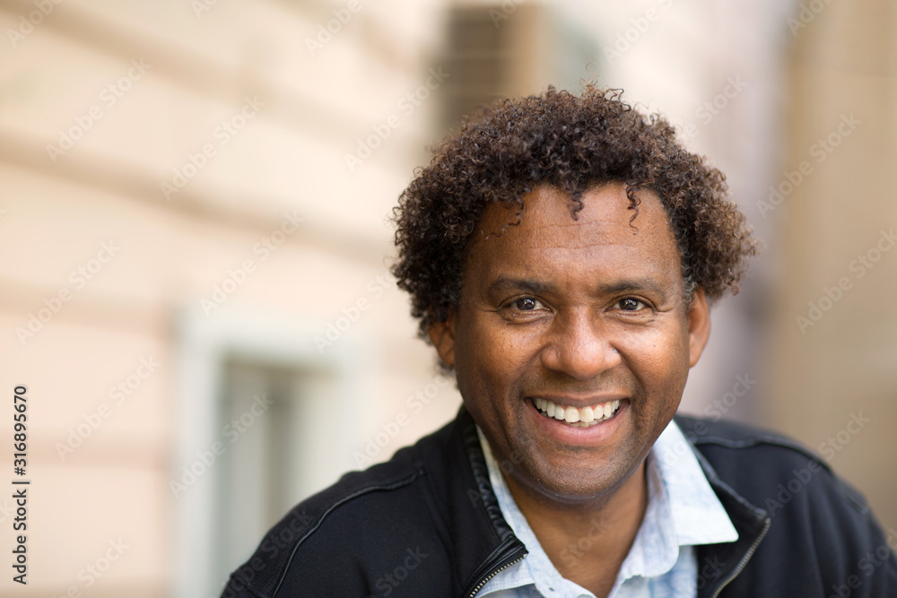 Well dressed mature happy African American man. Well dressed mature happy African American man.