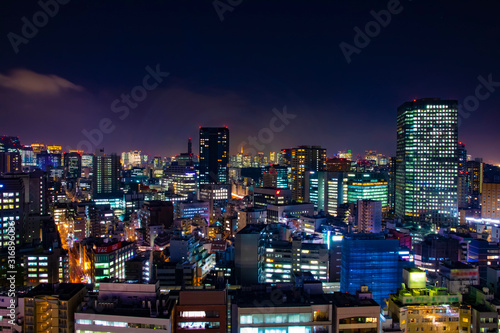 Photography A night cityscape at the urban city in Tokyo long shot