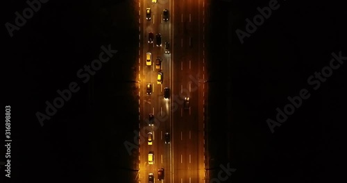 4K Aerial Top Drone View: Accident and traffic jam on the bridge in the evening after a working day. A huge number of cars on the road at rush hour. Downtown, city central part. Dnipro, Ukraine