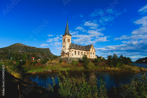 Lofoten Cathedral built in 1898 year, Lutheran parish church, Norway, Lofoten Islands, sunny summer day © tsuguliev