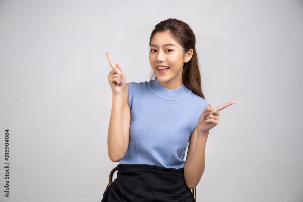 Tourist woman in summer casual clothes.Asian Smiling woman .Passenger traveling abroad to travel on white background.Asian woman going to summer vacation.Travel trip funny. Tourist woman in summer casual clothes.Asian Smiling woman .Passenger traveling abroad to travel on white background.Asian woman going to summer vacation.Travel trip funny.