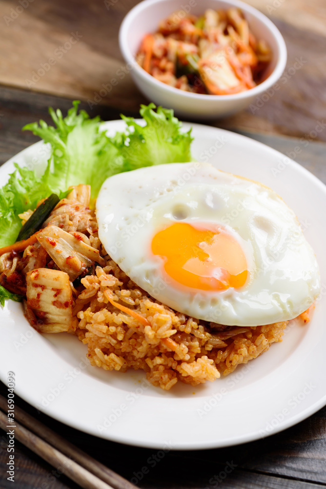 Kimchi fried rice with fried egg on top, Korean food Kimchi fried rice with fried egg on top, Korean food