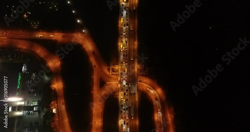 4K Aerial Top Drone View: Accident and traffic jam on the bridge in the evening after a working day. A huge number of cars on the road at rush hour. Downtown, city central part. Dnipro, Ukraine