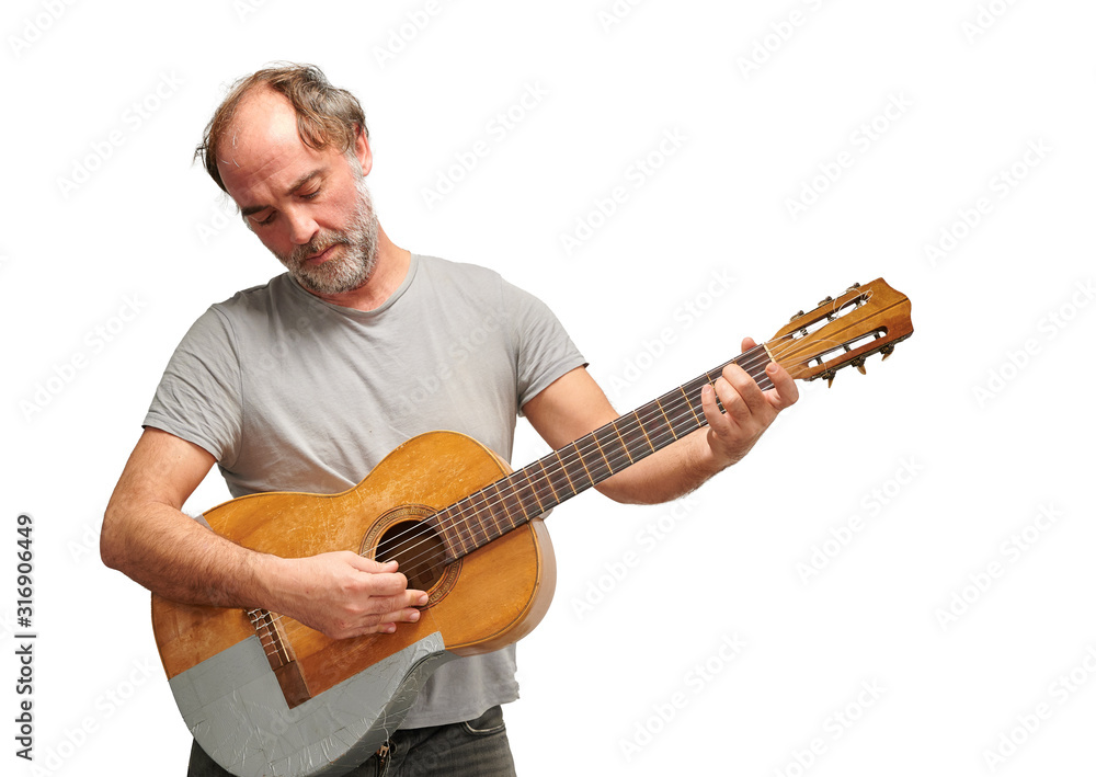 Obraz premium musician playing the broken guitar
