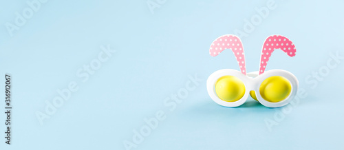 Easter banner with Easter bunny. Easter bunny glasses. Easter concept.
