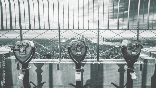 Beautiful scenery from the Empire State Building with binoculars reflecting on the ground