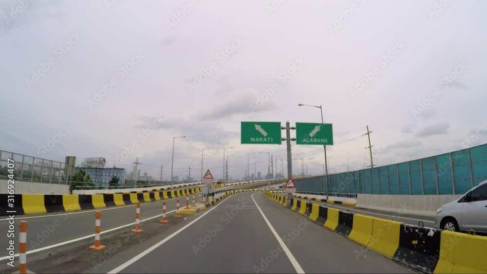 Car POV Shot Of Manila Skyway Exit