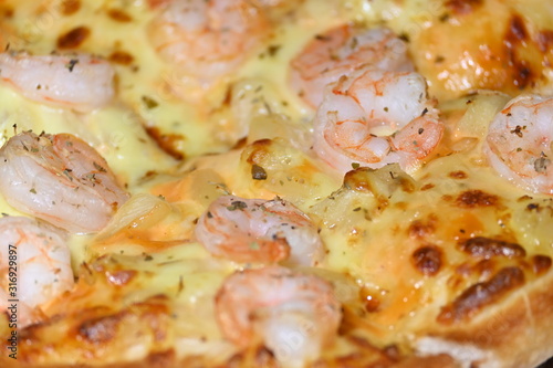 italian pizza cheese with pineapple and shrimp topping sea food