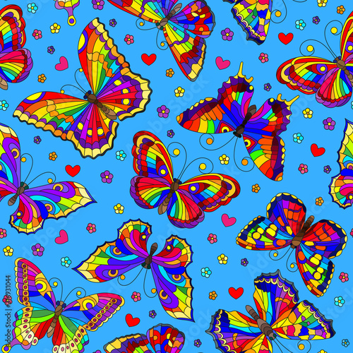 Seamless pattern with bright rainbow butterflies and flowers on blue background