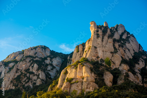 BARCELONA, SPAIN - December 26, 2018: The mountains of Montserrat in Barcelona, Spain. Montserrat  is a Spanish shaped mountain which influenced Antoni Gaudi to make his art works. © J Photography