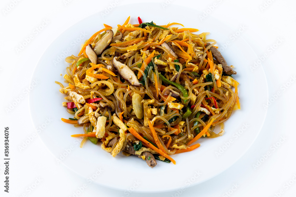 Stir fried Korean glass noodle with soy sauce called Japchae Stir fried Korean glass noodle with soy sauce called Japchae