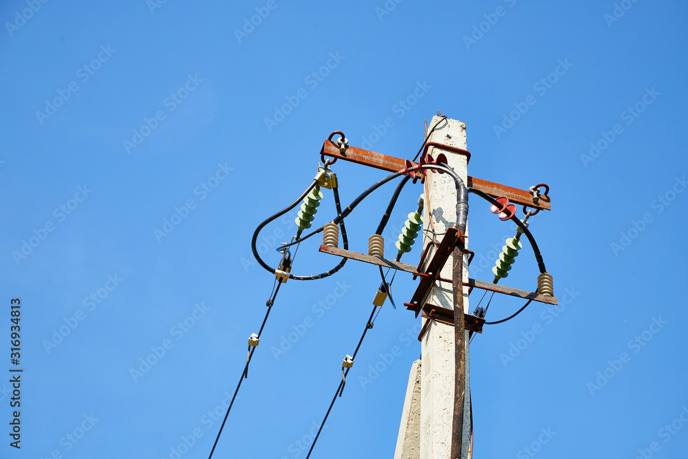 Electric power lines and wires with blue sky. Support of power lines in a nice day Electric power lines and wires with blue sky. Support of power lines in a nice day