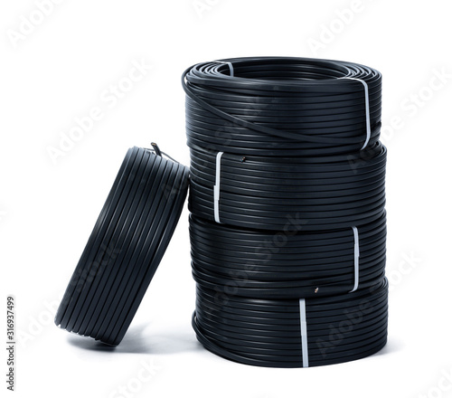 Coils of black cable isolated on white background