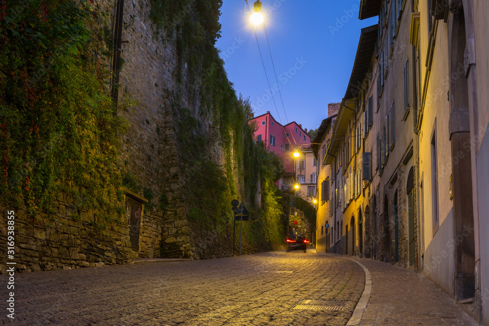 Beautiful architecture of the Bergamo old town at dawn, Italy