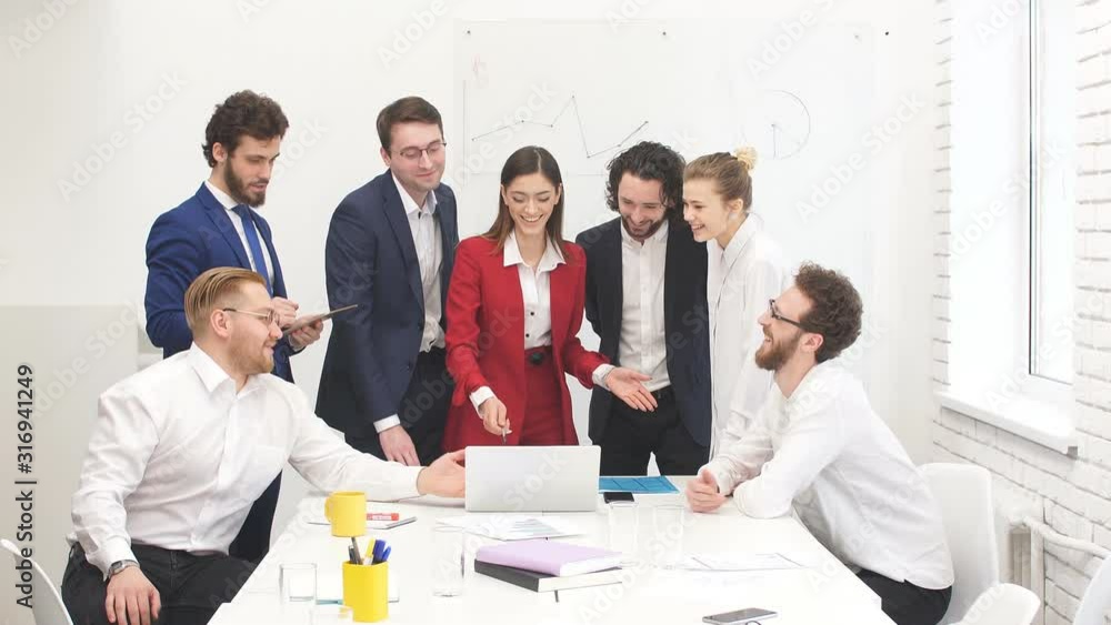 Best workers of successful busness team gathered in office to discuss new business project, to plan their strategy fot future together Best workers of successful busness team gathered in office to discuss new business project, to plan their strategy fot future together
