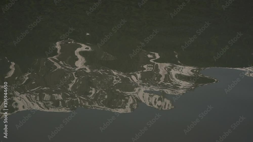 big dirty lake, pond or puddle on asphalt, flooding the street. reflection on water. Road floods due to the heavy rain in wet season.. background, surface, calm concept big dirty lake, pond or puddle on asphalt, flooding the street. reflection on water. Road floods due to the heavy rain in wet season.. background, surface, calm concept