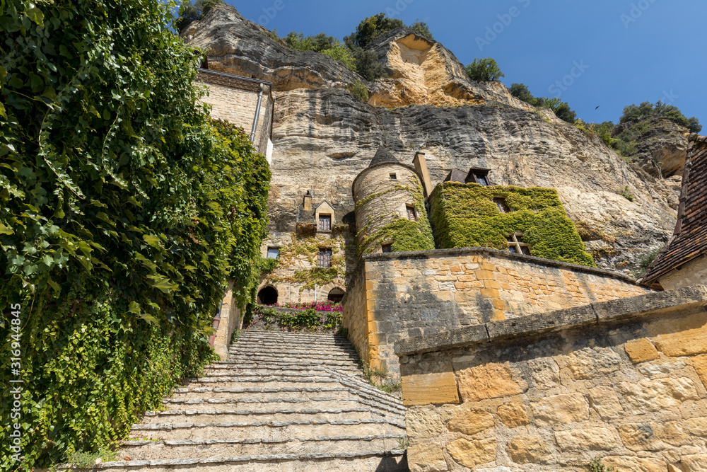  A majestic stone staircase in La Roque-Gageac a charming town in the Dordogne valley. France