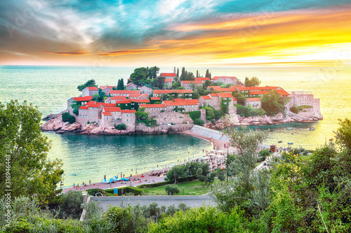 Aerial sunset view of the islet Sveti Stefan from church st. Sava viewpoint photo