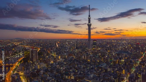 Aerial view Hyper lapse 4k Video of Tokyo   city on sunrise at Tokyo, Japan. (Blur text and Logo.)