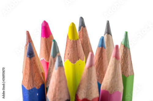 close up macro shot of colorful pencils on white background