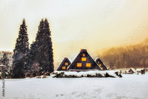 Light of Gassho Style Farmer House at Shirakawago Wolrd Heritage Village in Winter Snow Day, Gifu, Japan