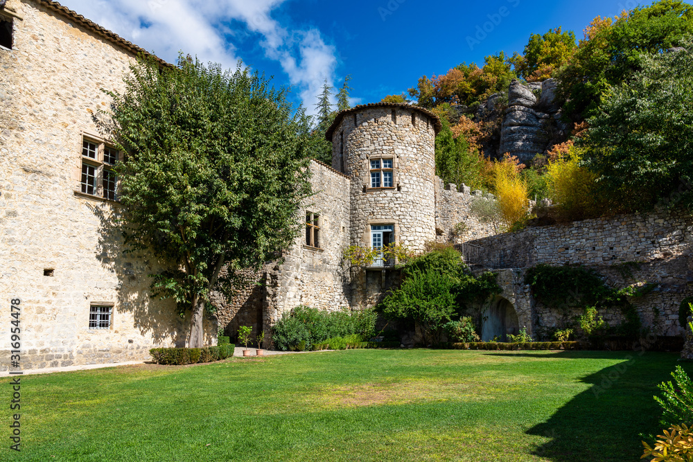 Stone castle in the medieval town of Vogue in Ardeche, France