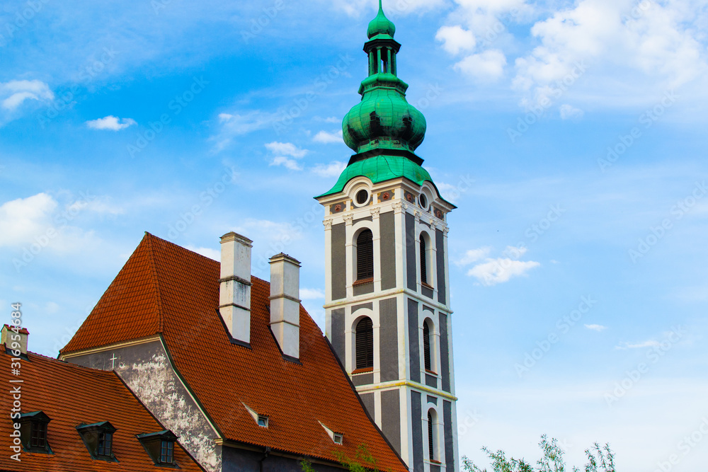 Tower of St. Jost Church, a gothic monument in Cesky Krumlov, Czech Republic