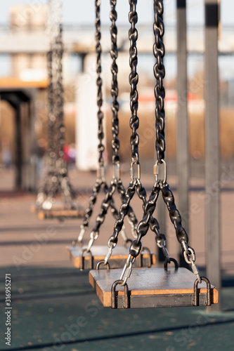 Empty swing on chains for adults and children for relaxation and