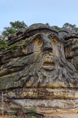Sculptures Devil s heads in the village Zelizy - Czech republic