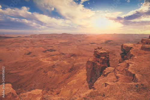 Beautiful dramatic sunset over the desert. Nature landscape. Makhtesh Ramon Crater  Israel