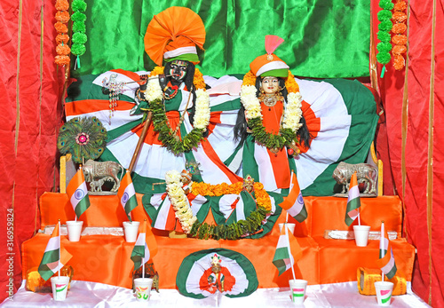 Idol of Lord Krishna & Radha decorated by Tricolor National Flag of India ahead of the Republic Day 2020 at Banke Bihari Temple in Beawar, Rajasthan, India. Photo/Sumit Saraswat