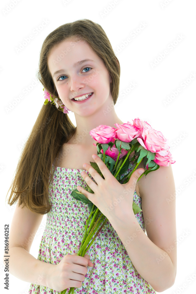 Little girl with a bouquet of flowers.Concept of holiday, summer Little girl with a bouquet of flowers.Concept of holiday, summer