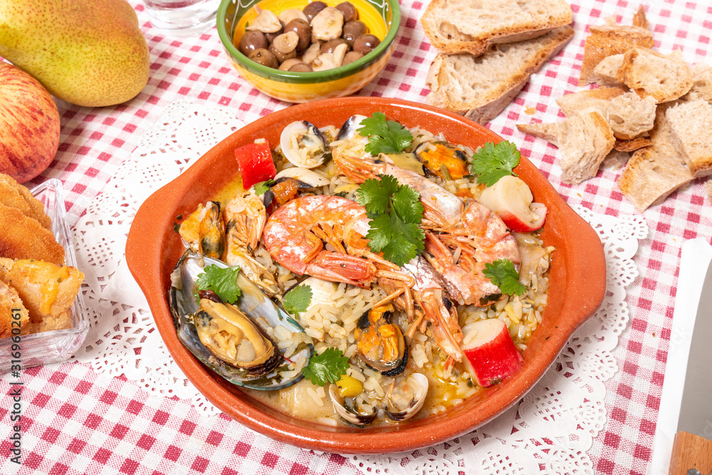 Traditional homemade meal of rice and seafood. Traditional homemade meal of rice and seafood.