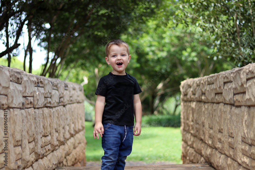 Young Boy on bridge