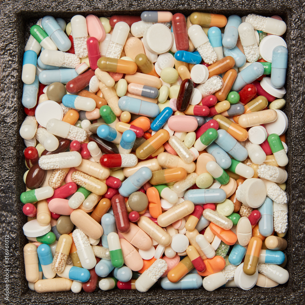 Medizin Hintergrund mit bunten Medikamenten Medizin Hintergrund mit bunten Medikamenten