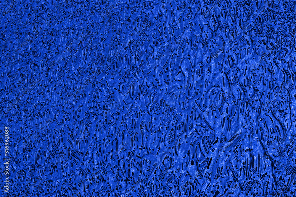 Fondo abstracto en color azul. Textura abstracta de fondo azul con formas  onduladas. ilustração do Stock