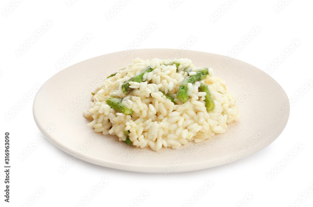 Delicious risotto with asparagus isolated on white