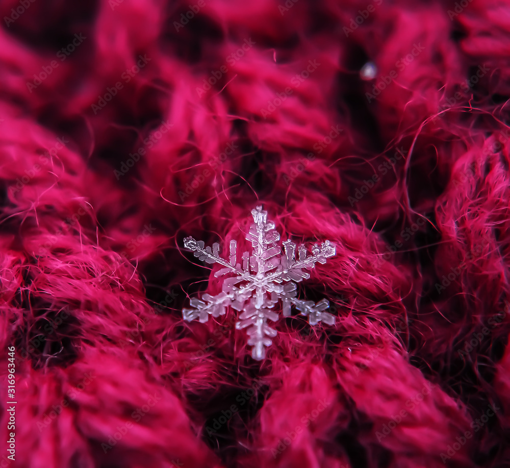 Snowflake beautiful on the red winter background Snowflake beautiful on the red winter background