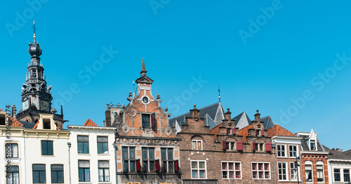 stepped gable houses and Kerkboog Gate on square Grote Markt in Nijmegen, The Netherland