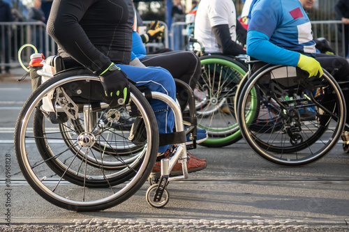 Disabled athlete on a wheelchair doing marathon.