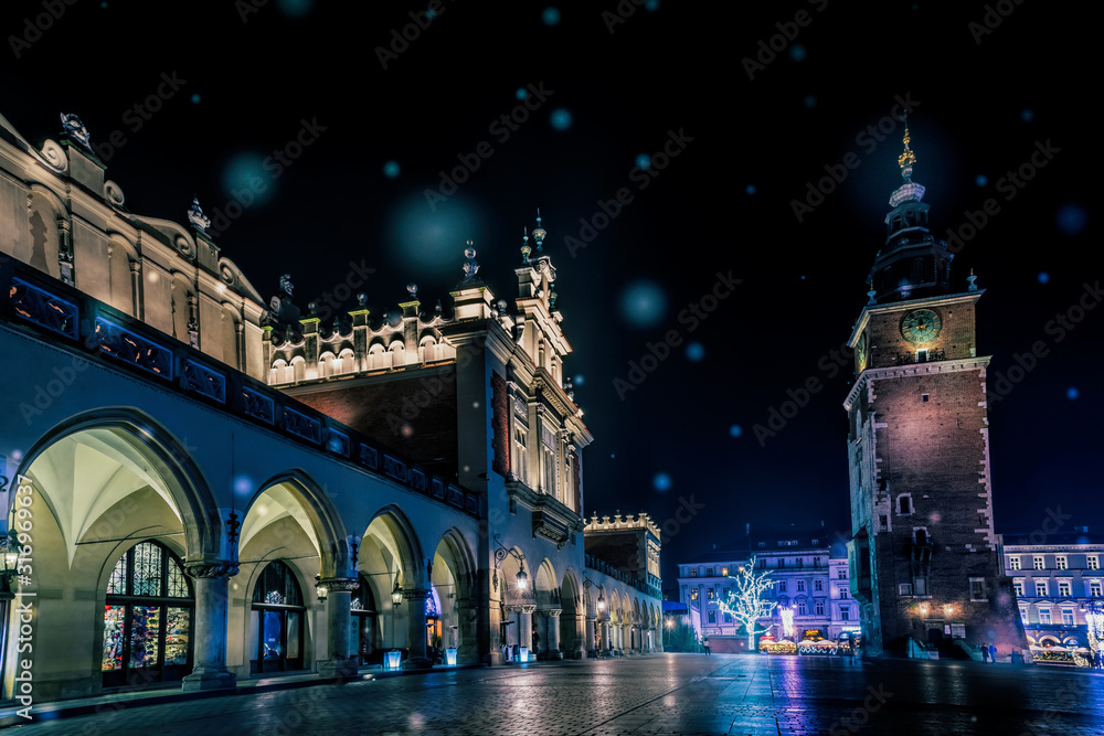 Fototapeta premium Colorful Christmas Krakow. Old Market Square and City Hall Tower