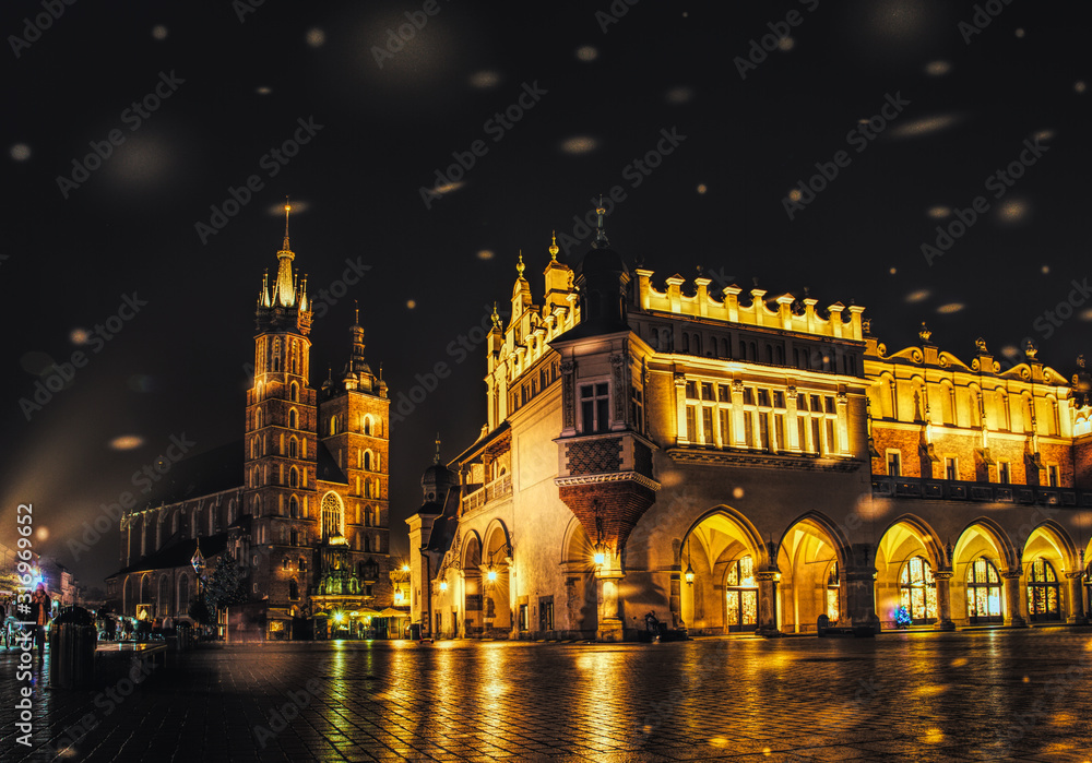 Colorful Christmas Krakow. Old Market Square and City Hall Tower