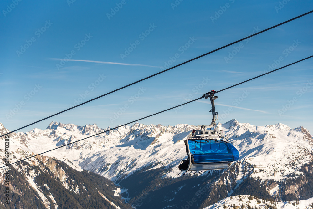 Ski cable lift in the Alps. Austrian Alps ski resort. Ski cable lift in the Alps. Austrian Alps ski resort.