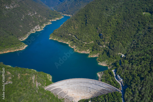 Aerial view, dam of Diga di Ponte Cola -Valvestino, Lake Valvestino, Italy. Beautiful lake between the mountains