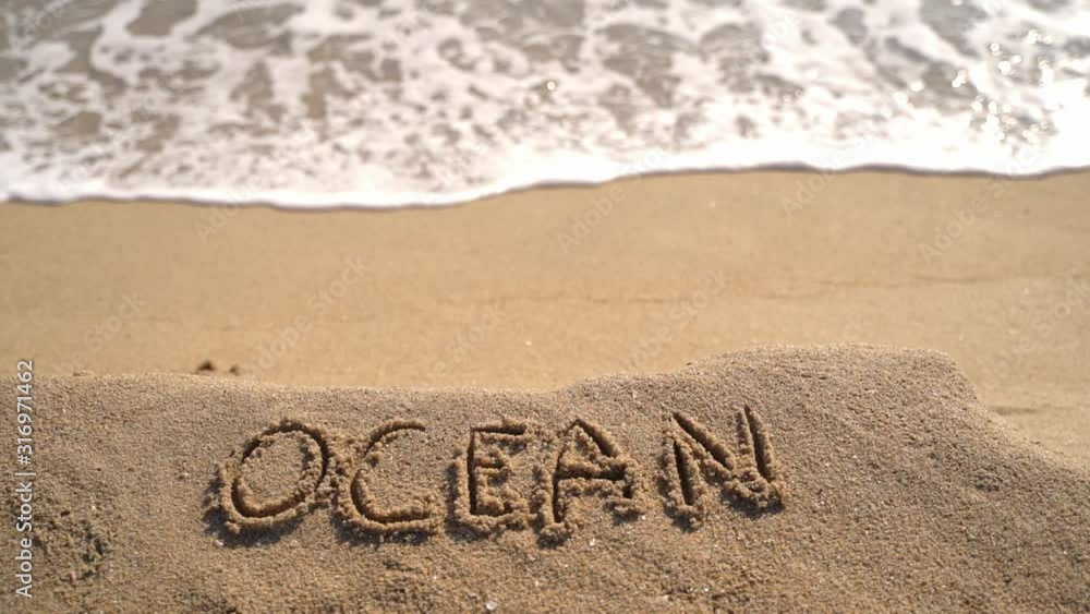 Hand written text ocean the beach. meditation. slow motion
