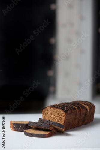 Fresh brown bread slice isolated on white background