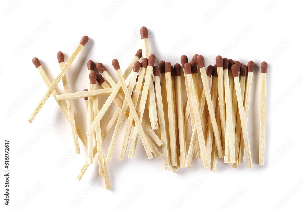 Pile of matches, matchsticks isolated on white background, top view Pile of matches, matchsticks isolated on white background, top view