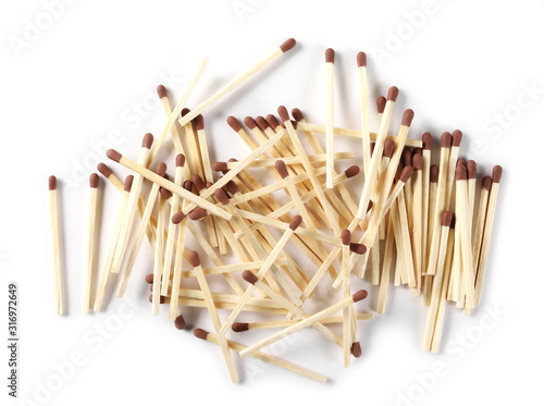 Pile of matches, matchsticks isolated on white background, top view